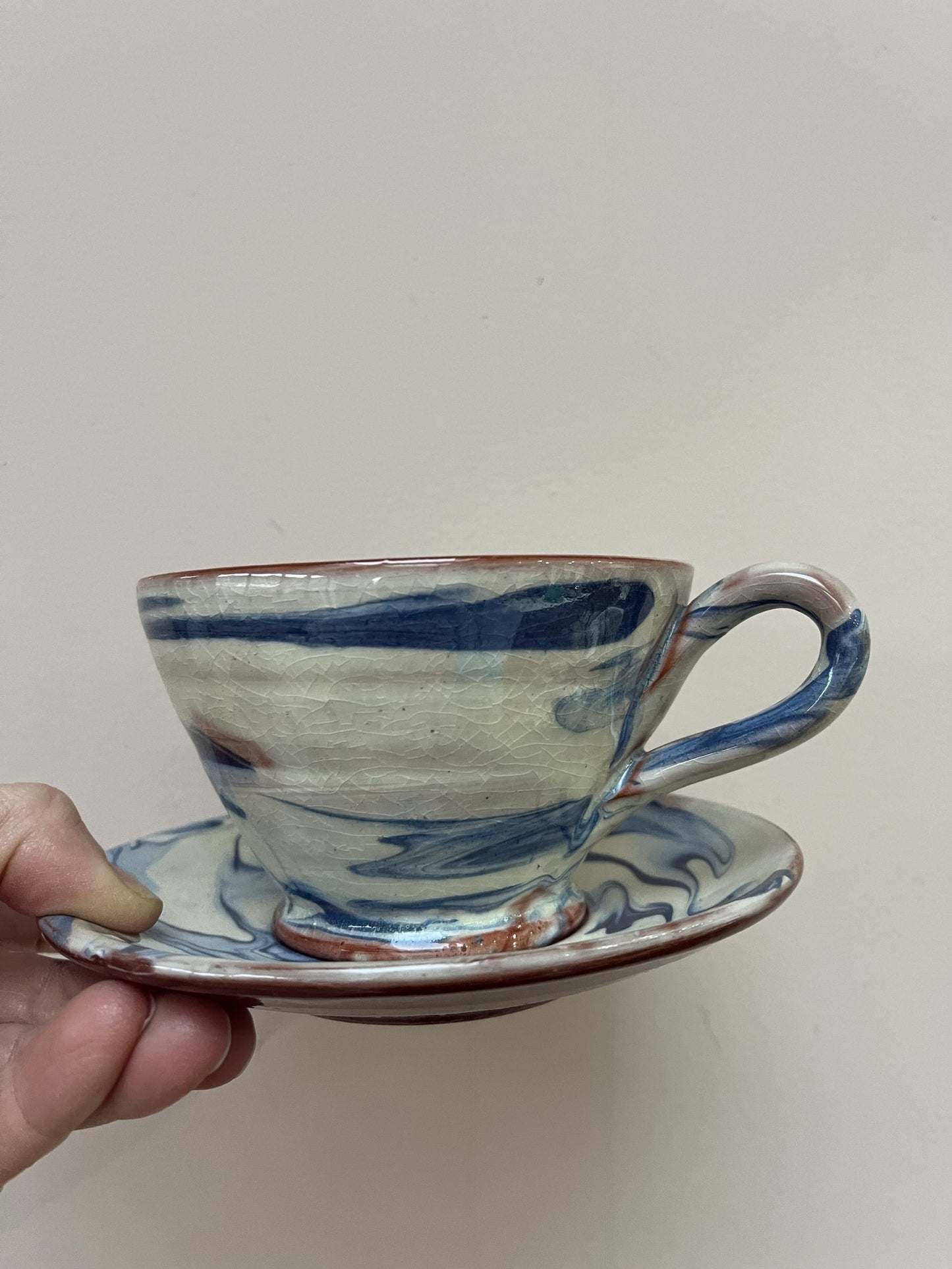 Blue cream marble swirl cup and saucer set
