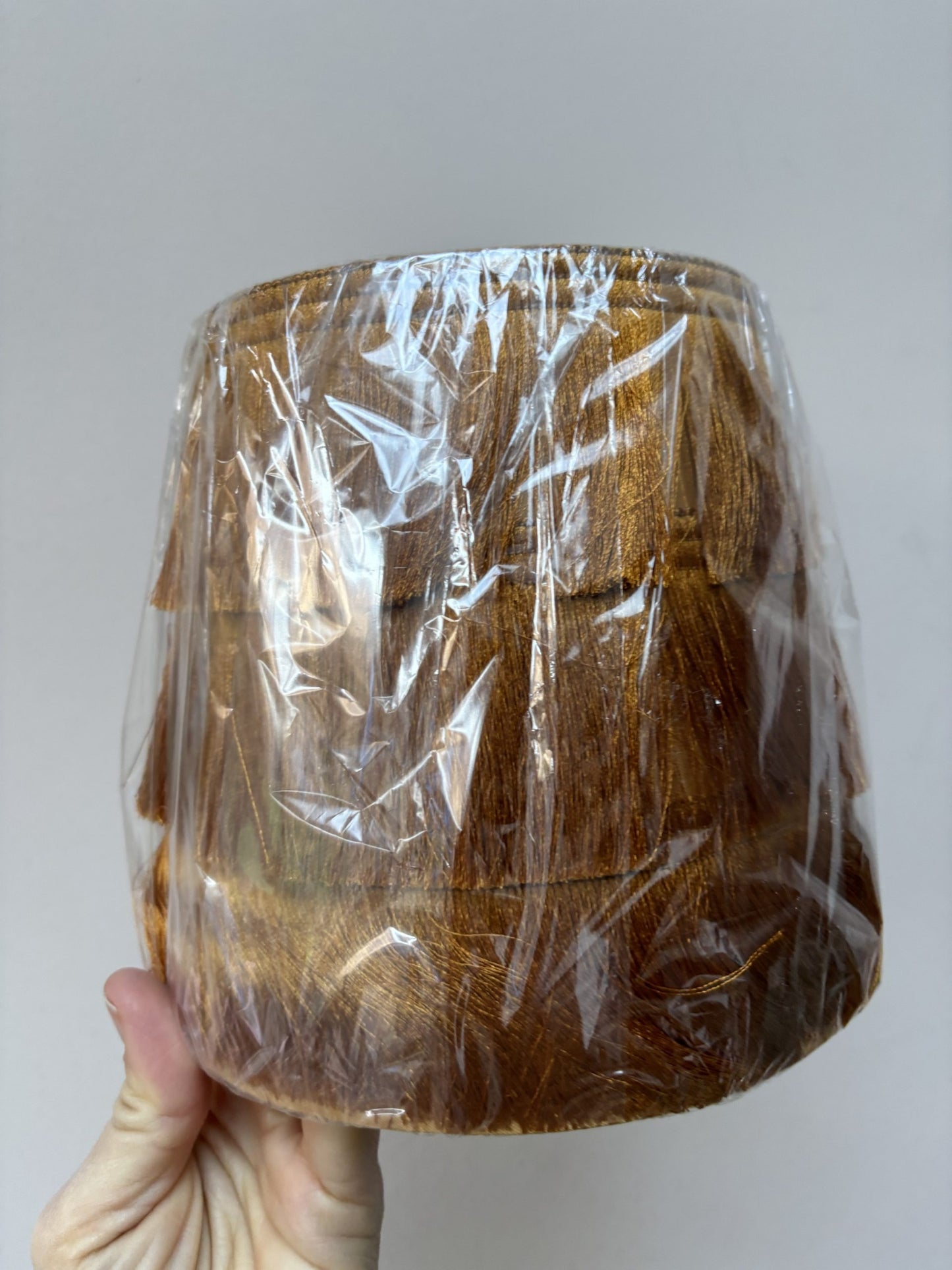 Small burnt orange fringed lampshade