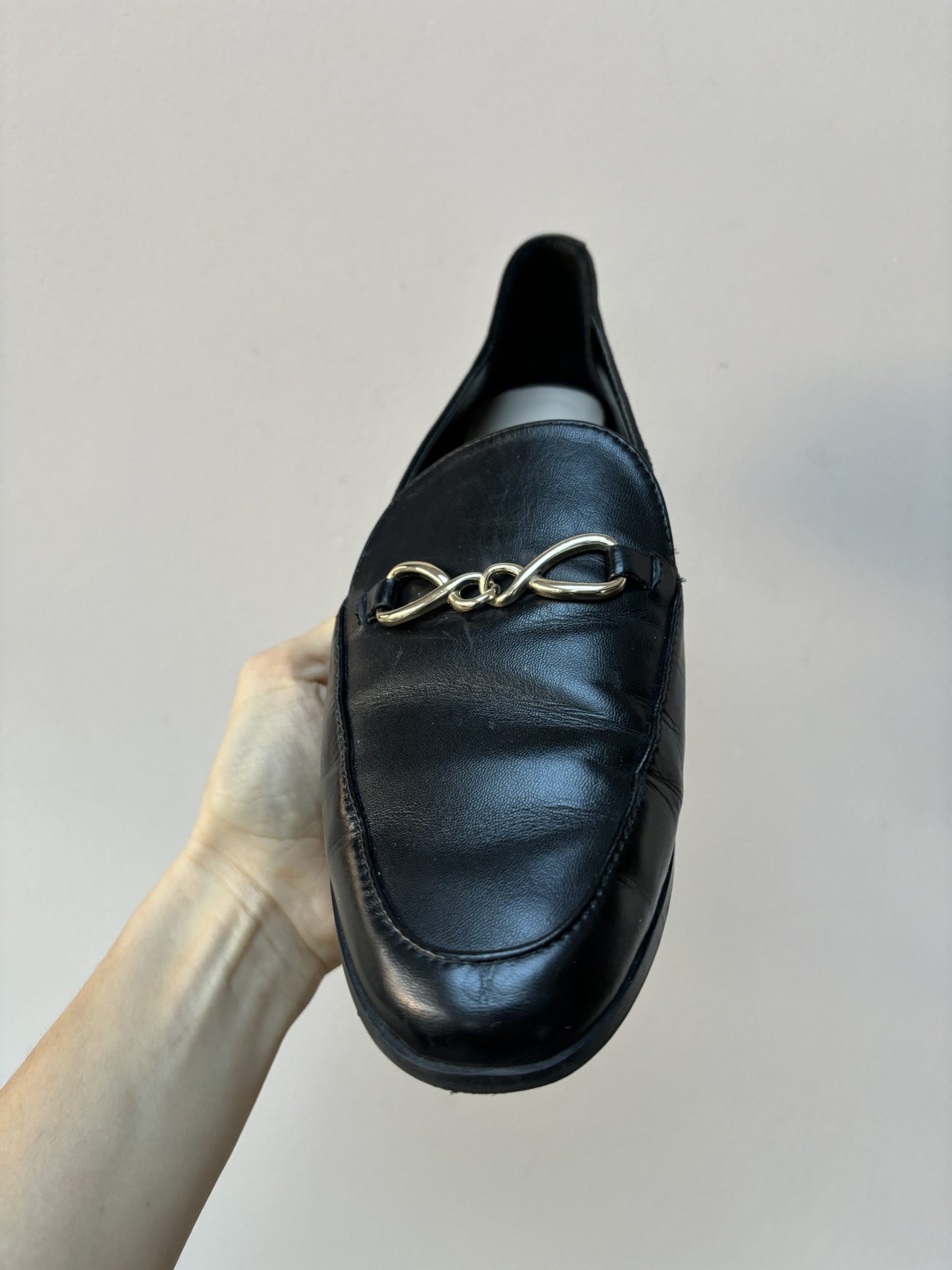 Black leather loafers with gold buckle UK5