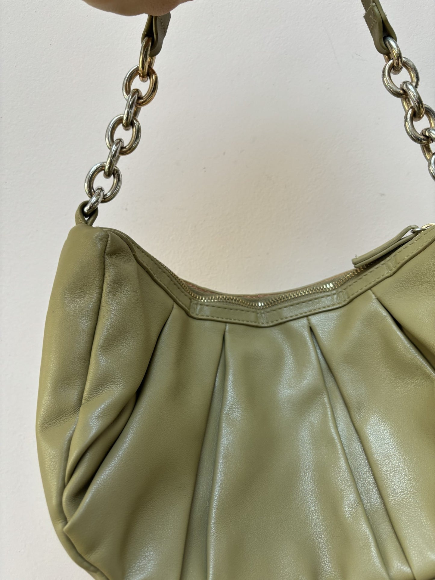 Green faux leather handbag with gold chain strap