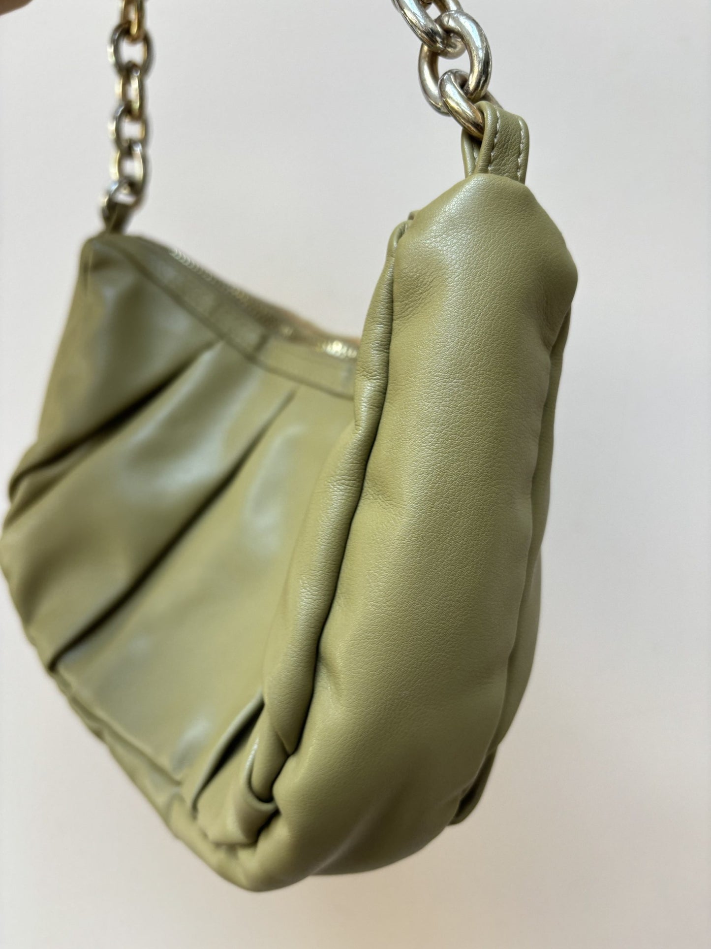 Green faux leather handbag with gold chain strap